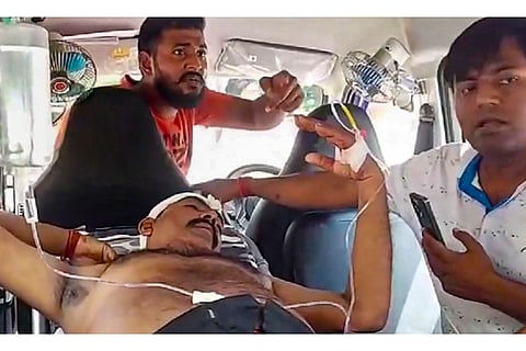 BJP's Bengal Bandh: A BJP worker being taken for treatment after he sustained injuries in North 24 Parganas